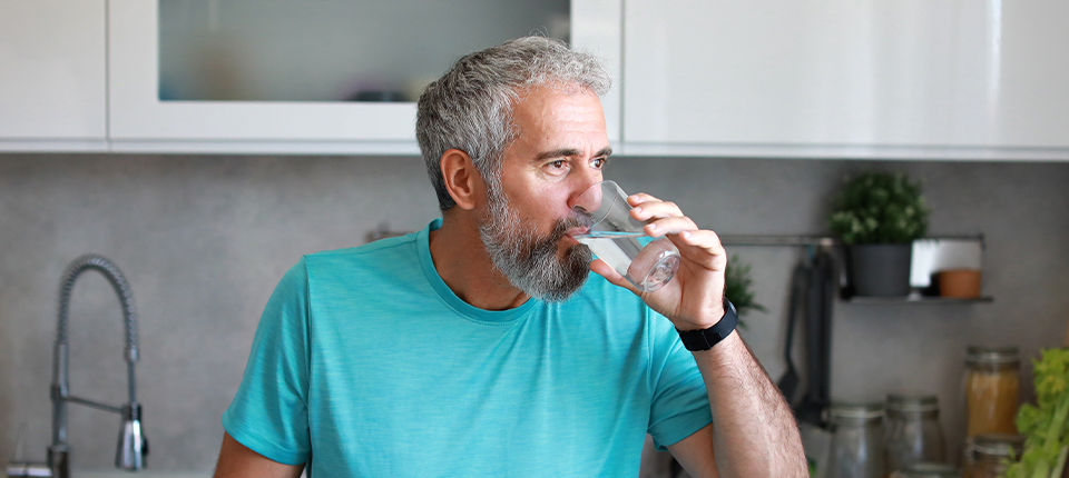 A man drinking water