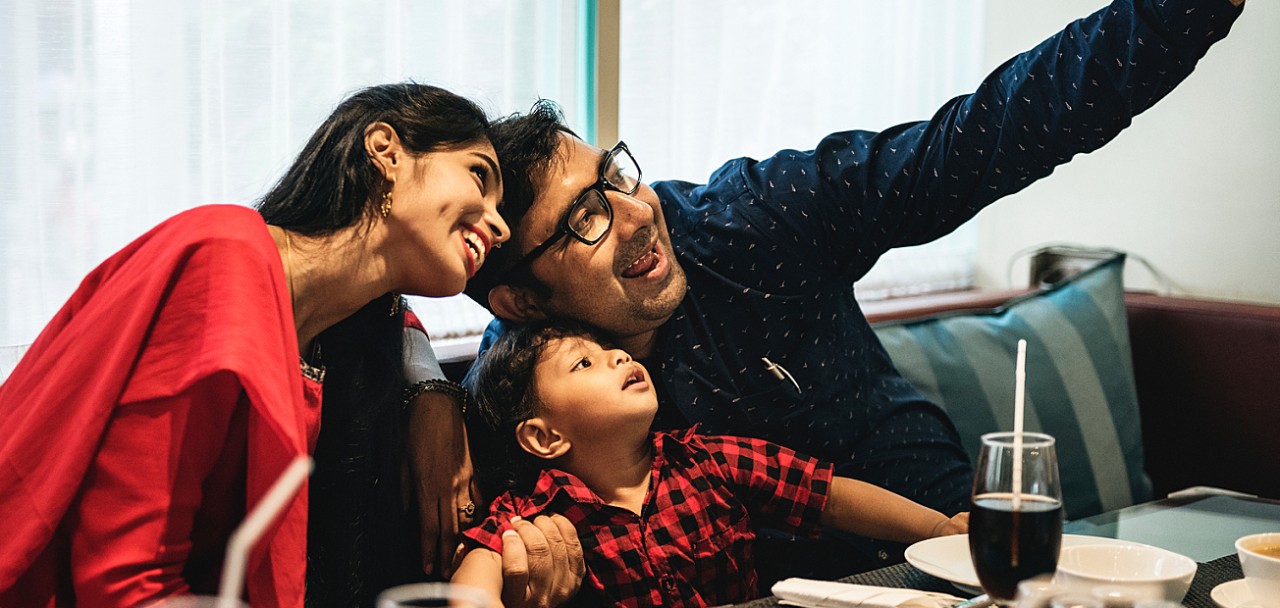 Indian family out in restaurant