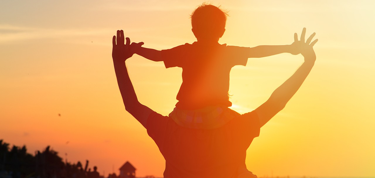 father and son having fun on sunset beach; Shutterstock ID 255375775; PO: 123