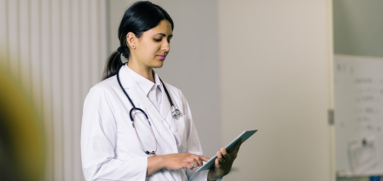 female doctor using a tablet pc.; Shutterstock ID 690329752; PO: 123