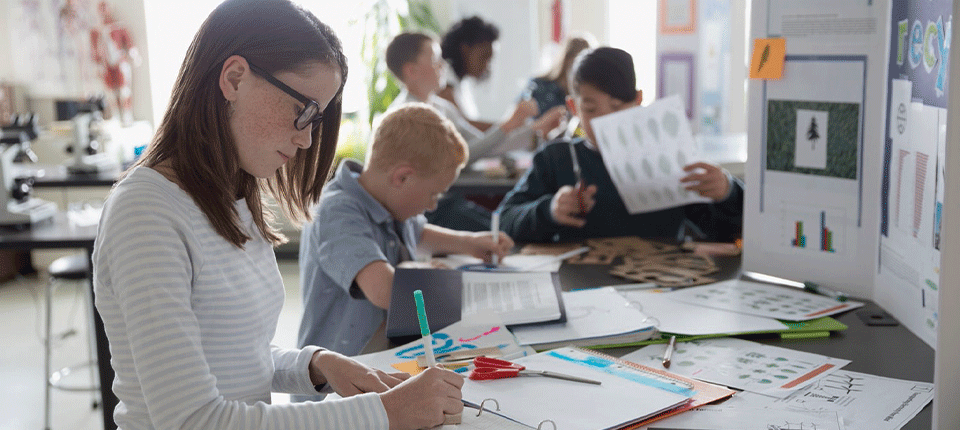 a young lady and kid studying